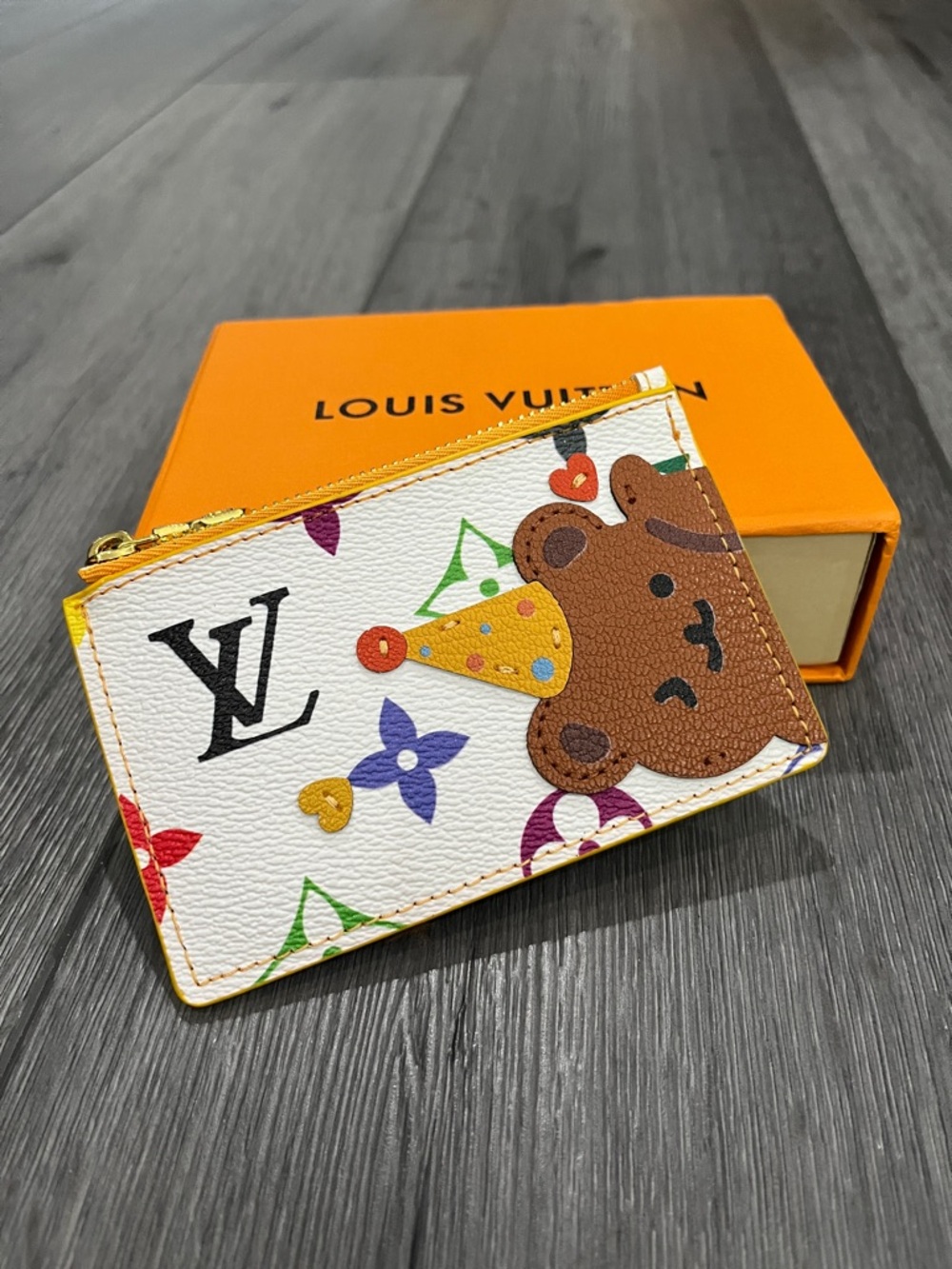 Louis Vuitton x Nigo Bear Coin/Card Holder featuring a playful Bear motif.